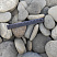 Kamenclub.ru: Галька речная плоская (серо-белая) фр. 70-120 мм. купить  в Саратове галька галечник речной серый, белый окатанная плоская  природная галька 9000 руб/т   фото КАМЕНЬ КЛУБ